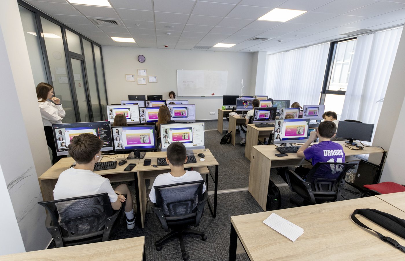 Atelier IT IUCOSOFT — copii la calculatoare